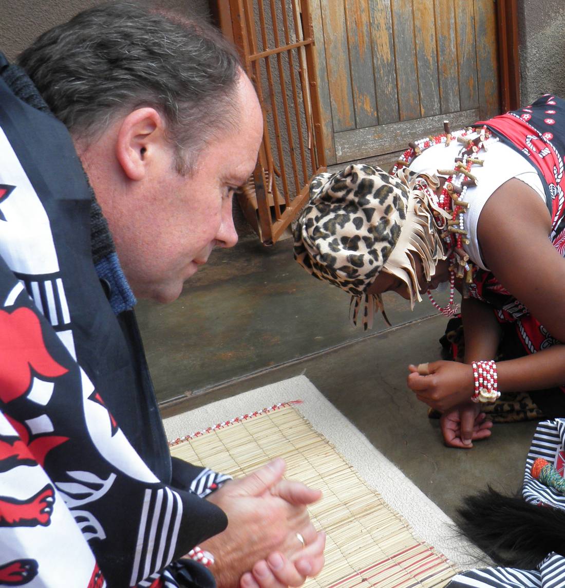 Dr S D Knight at a traditional healing ceremony, in traditional dress